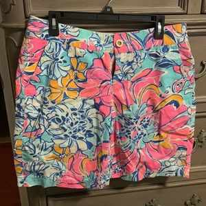 10 inch long and 17 1/2 inches at waist Lilly Pulitzer Bermuda shorts